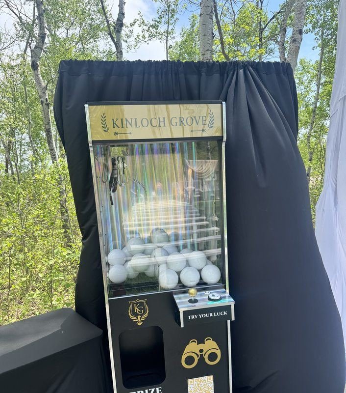 Kinloch Grove branded black claw machine Partyology Inc Winnipeg
